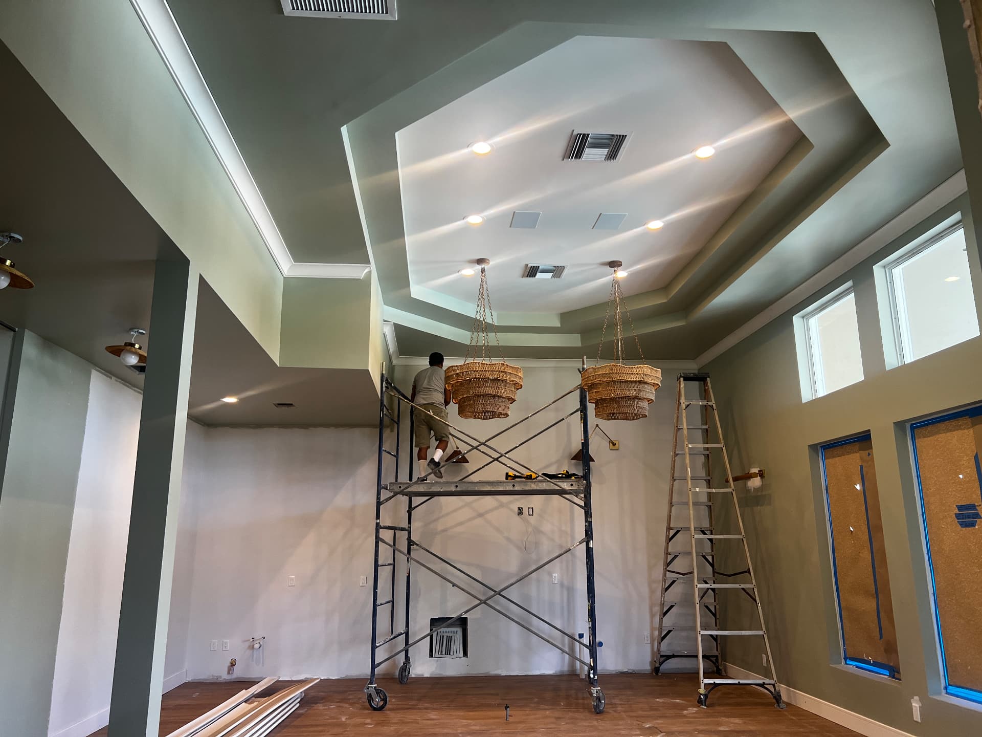 Finished tray ceiling with cove lighting in a BenShell residential project