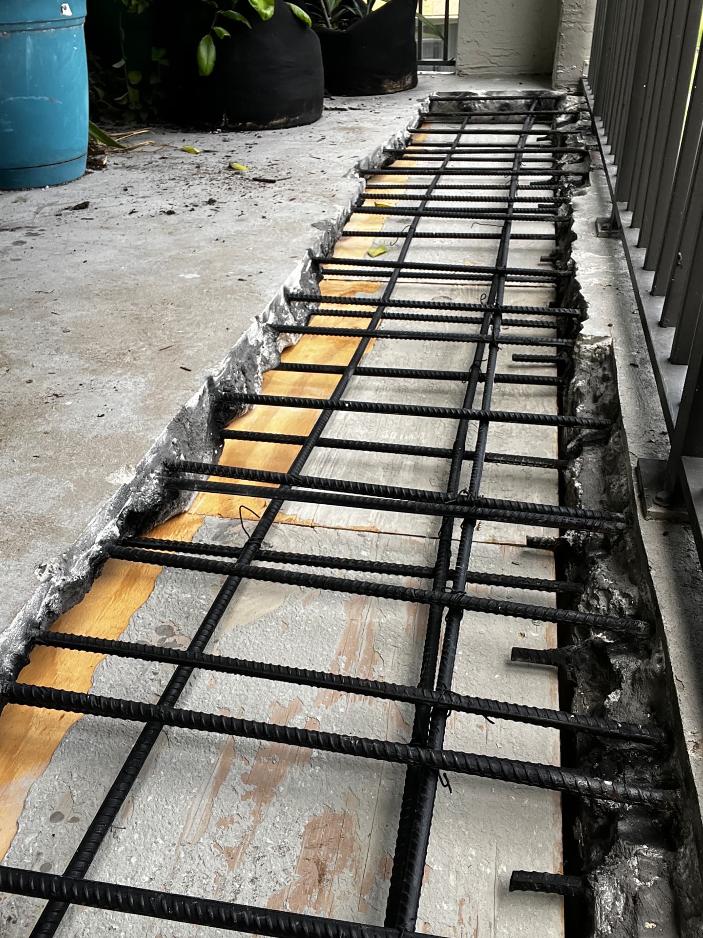 Rebar layout for walkway slab restoration